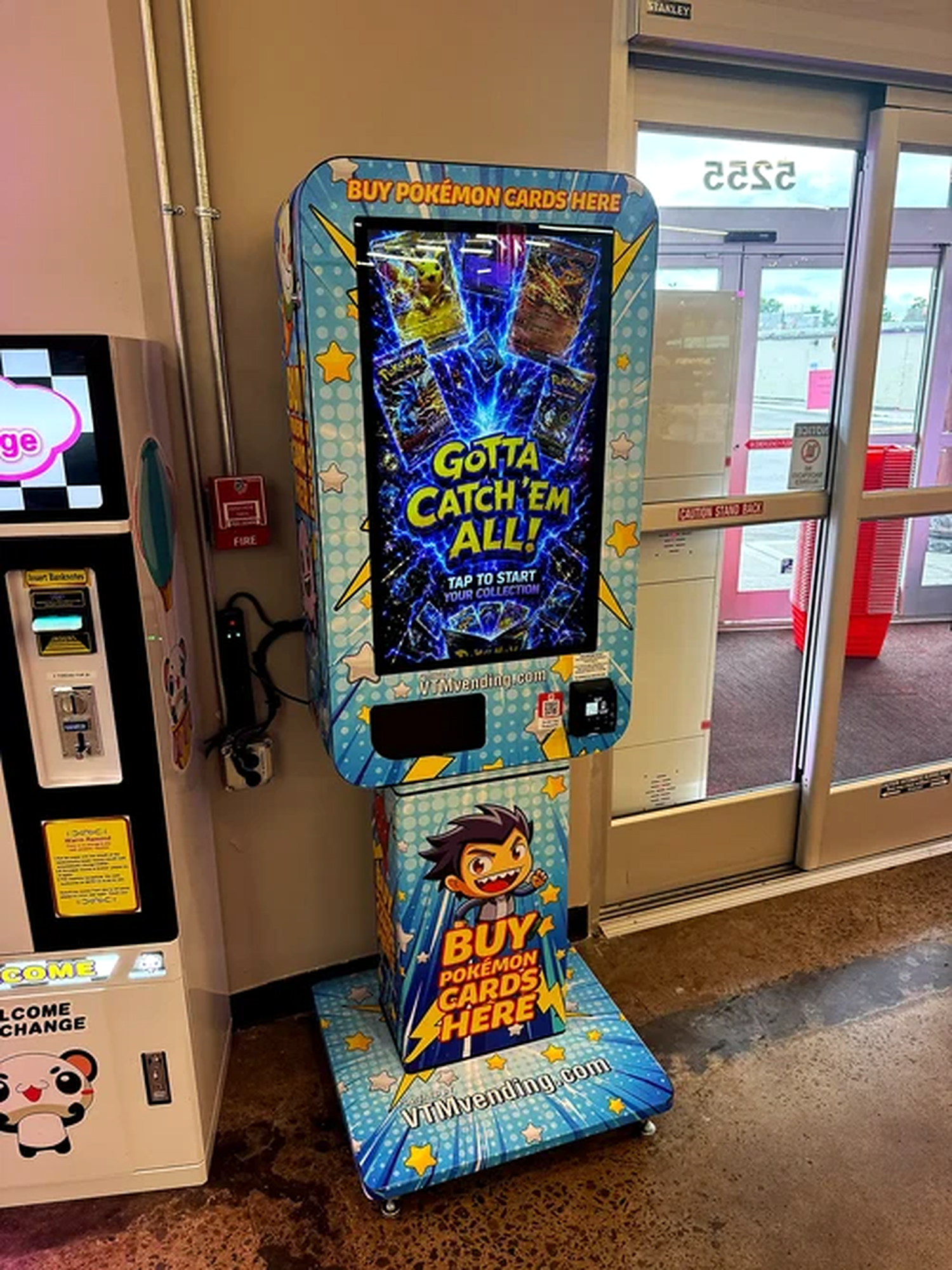 Freestanding Pokémon card vending machine near a retail entrance