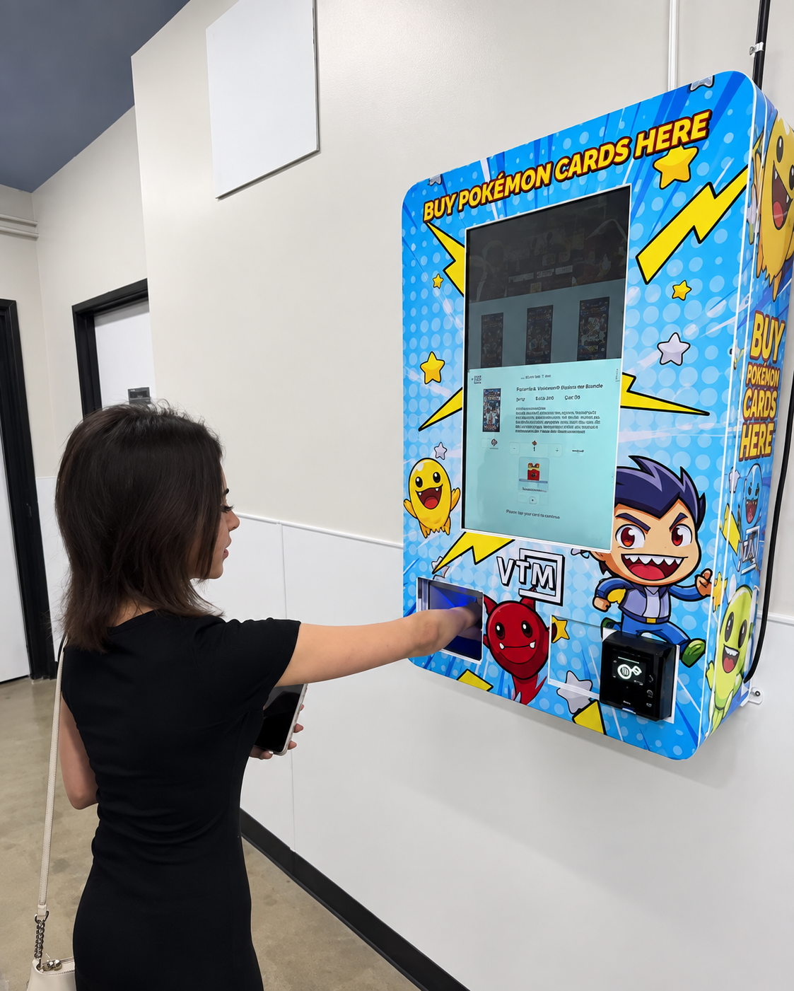 Customer using a wall-mounted Pokémon card vending machine