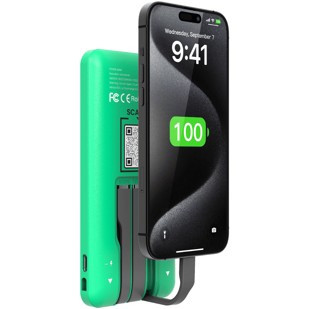 Green portable power bank charging a smartphone